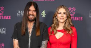 Billy Ray Cyrus and Elizabeth Hurley Cozy Up on The Inheritance Red Carpet